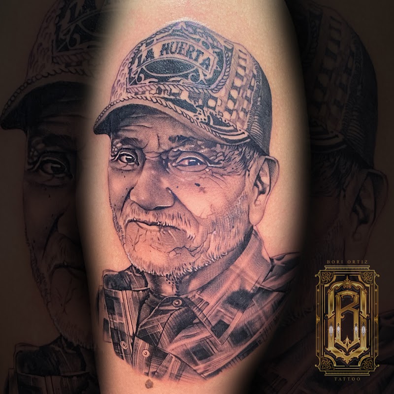 Photo of Cosa Nostra tattoo Lounge