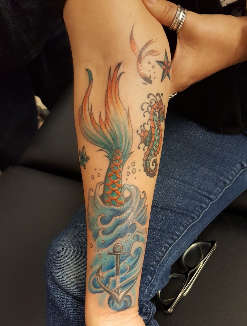 Photo of Stained Purity Tattoo