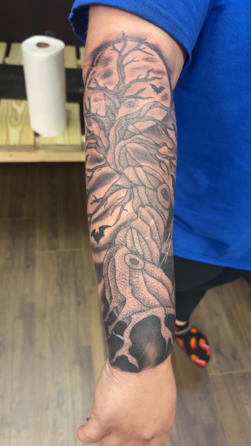 The Shop Tattoos and Piercing photo 2