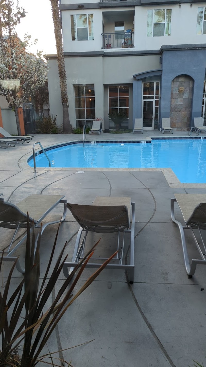 Photo of Archestone Apartments Swimming Pool and Barbecue Area