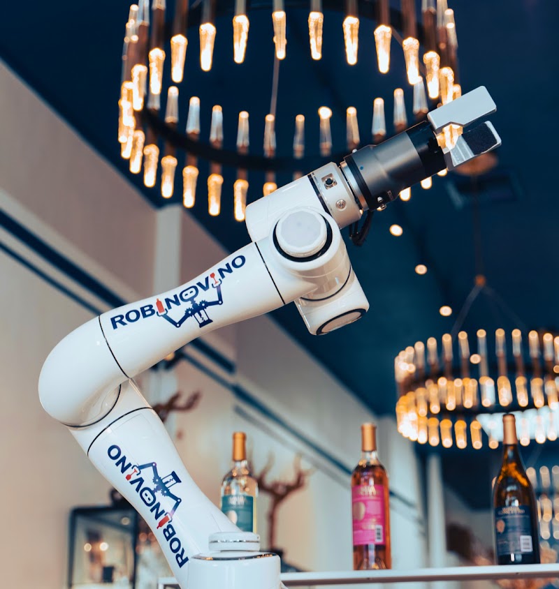Photo of RobinoVino - Robot-Sommelier Pouring Wine