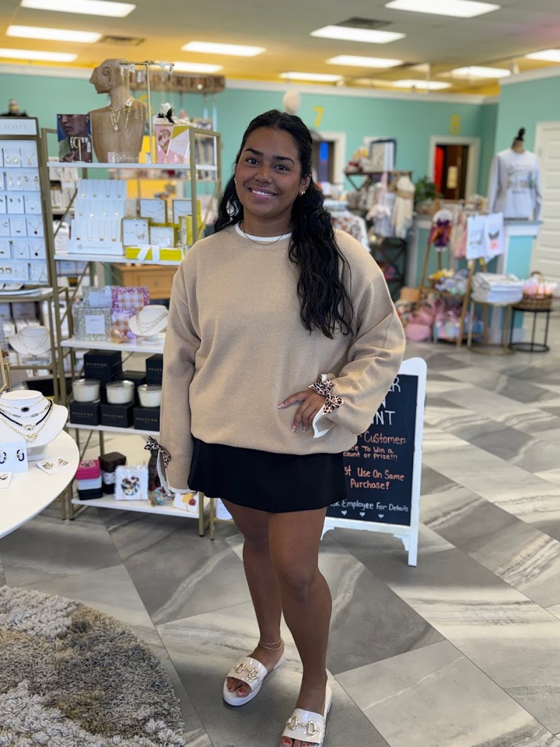 Grand Boutique Tan & Gifts photo 2