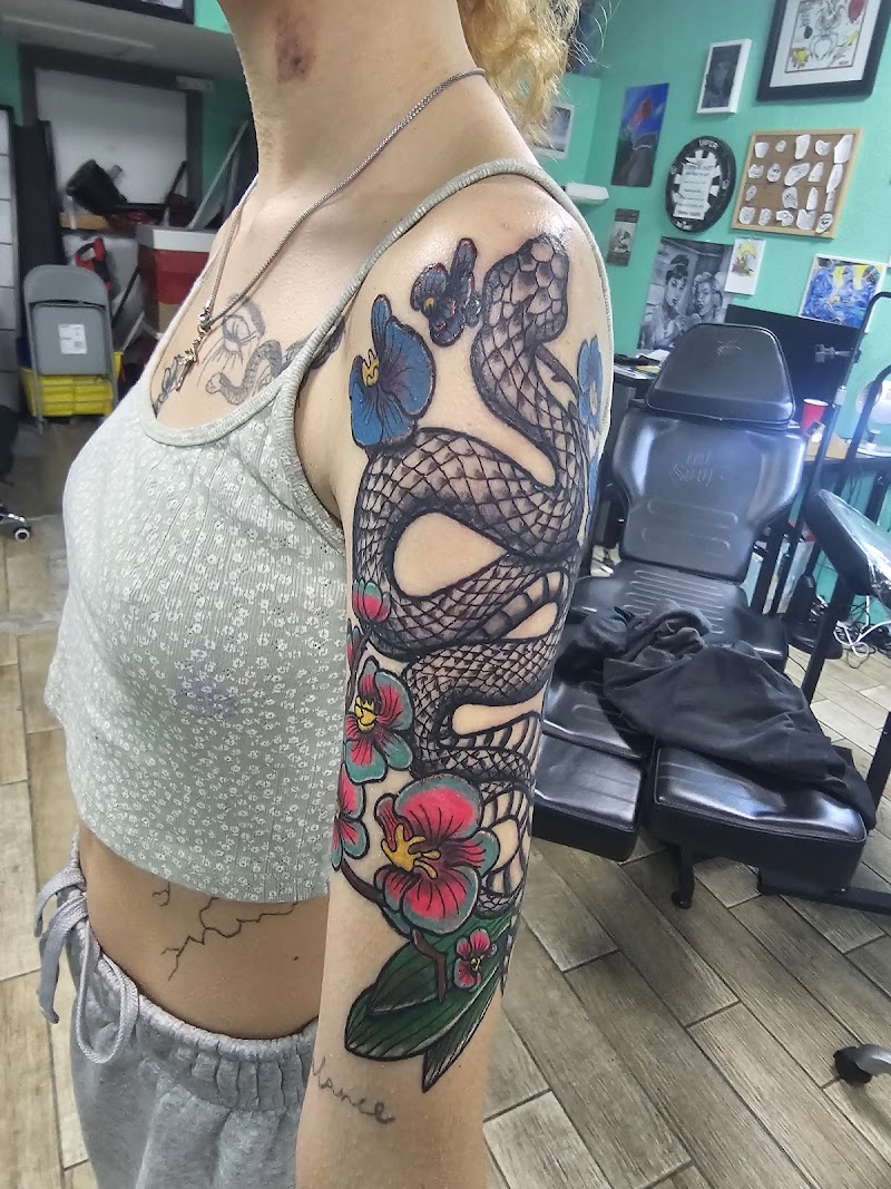 Photo of Myth and Muse Tattoo
