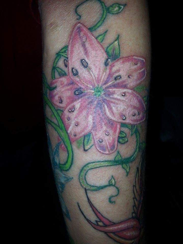 Photo of Dvine Design Custom Tattoo