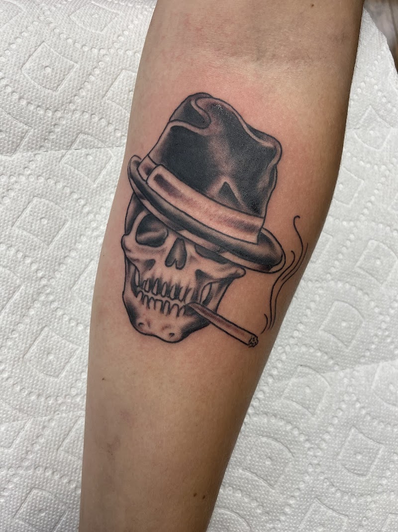 Photo of Wolf & Flame Tattoo