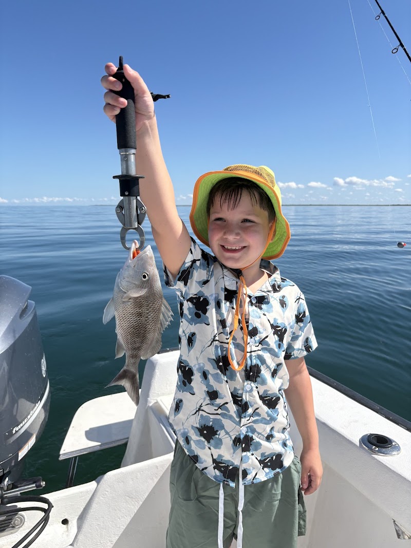 Capt. Luke with Cat 5 Fishing photo 3