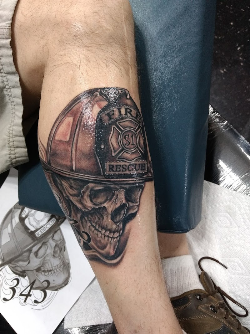 Damaged Lifestyle Tattoos photo 2