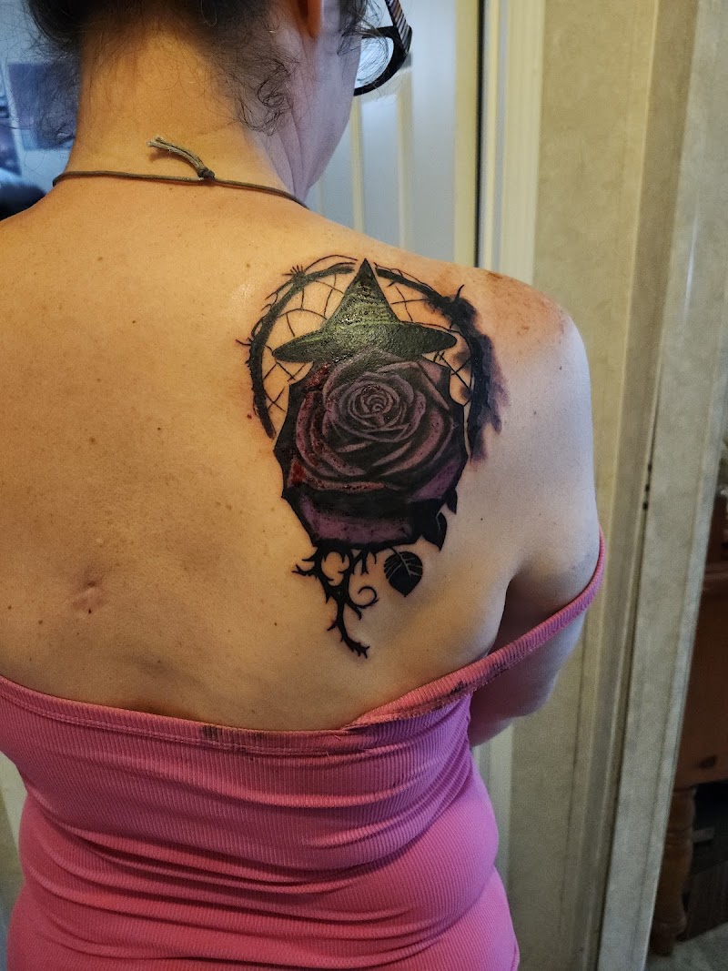 Photo of Twisted Asylum Tattoo