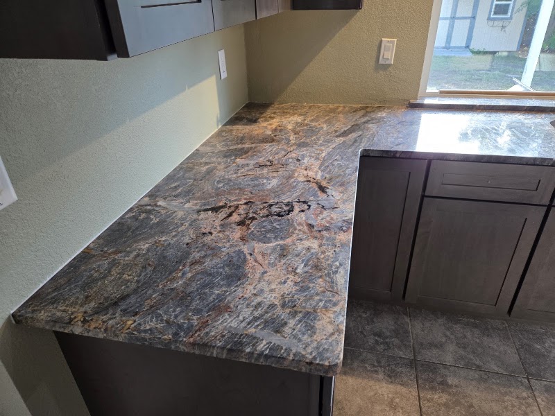 Lugo's Natural Stone Work, Cabinets & LVP photo 5