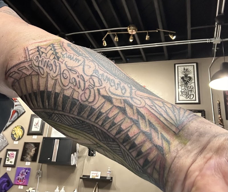 Eleventh Dimension Tattoo Arts photo 4