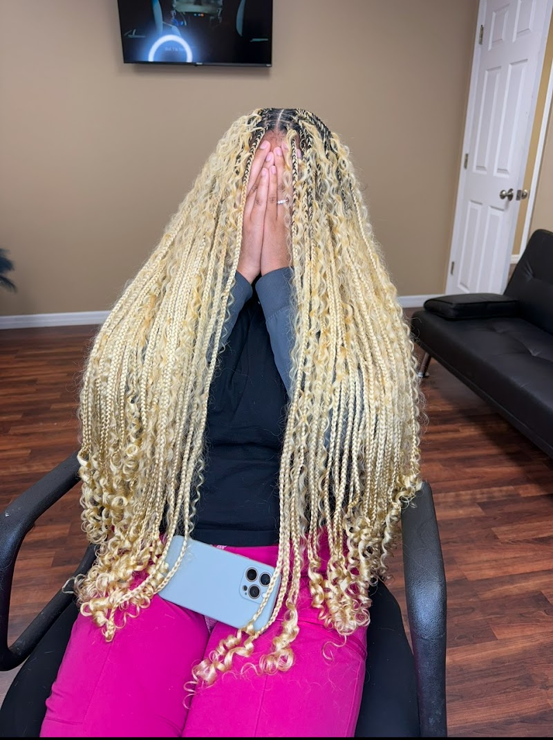Photo of The braid doll LLC