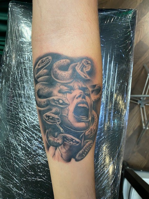 Photo of Ink of Art Tattoo Collective